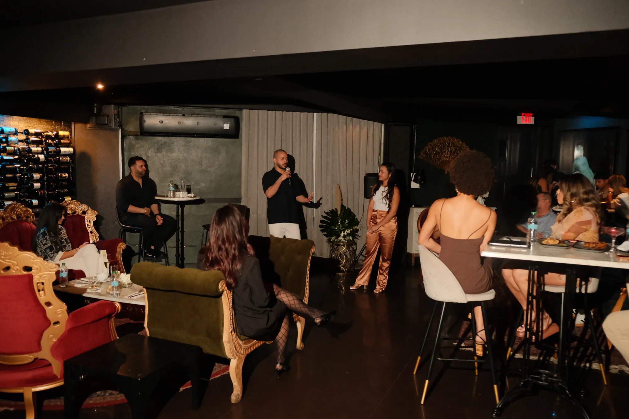 Gabriel speaking to a room of people
