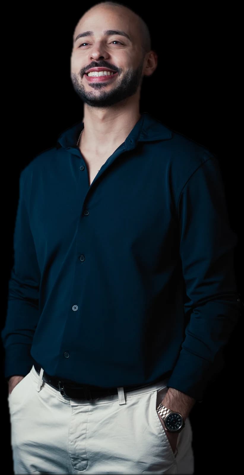 Gabriel in a navy shirt, hands in his pockets